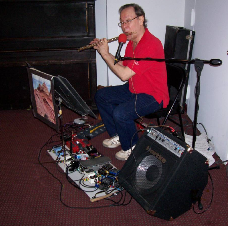 Lee McClure performing with electric flute rig